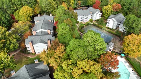 Fall-autumn-leaves-changing-color-in-neighborhood-drone-flyover