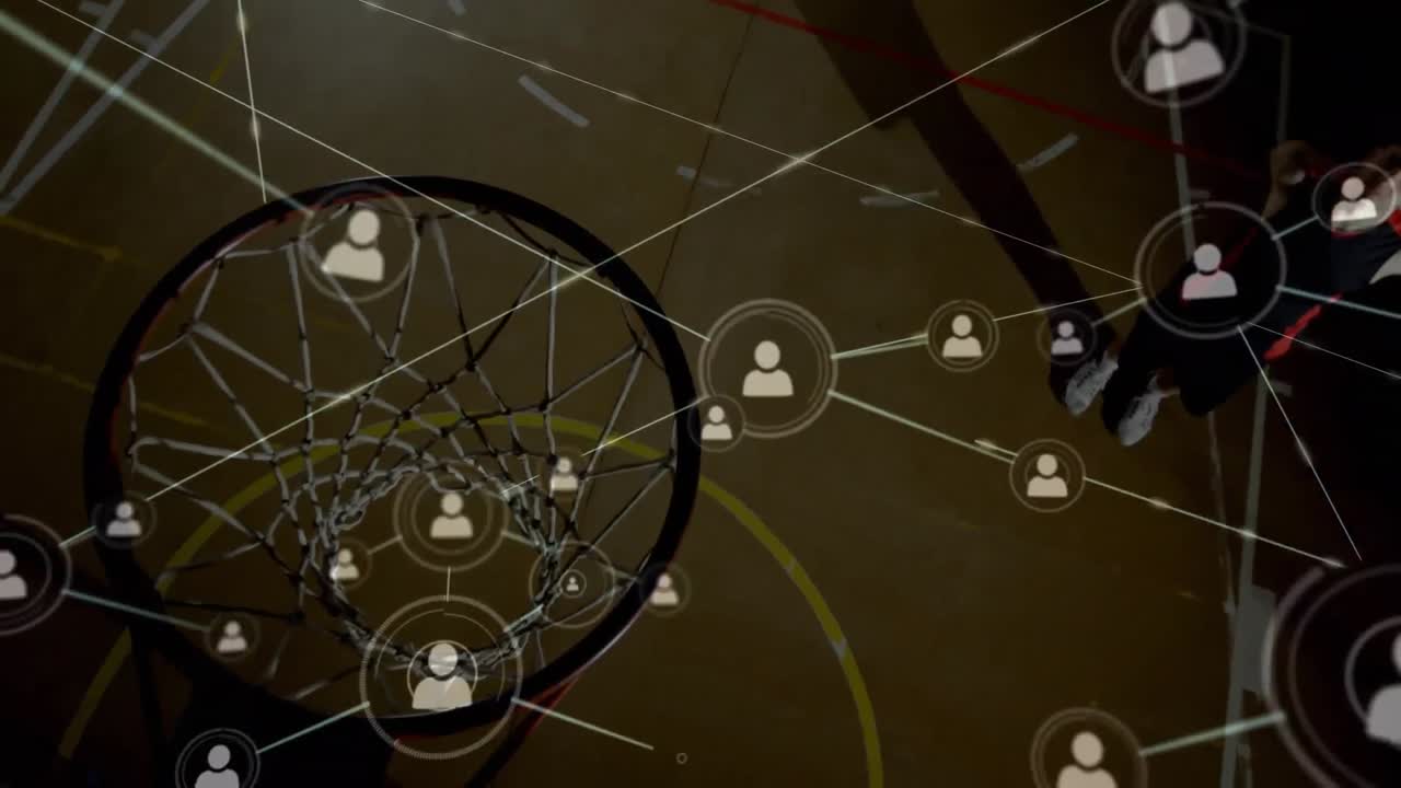 Animation of networks of connections over mixed race male basketball player at gym