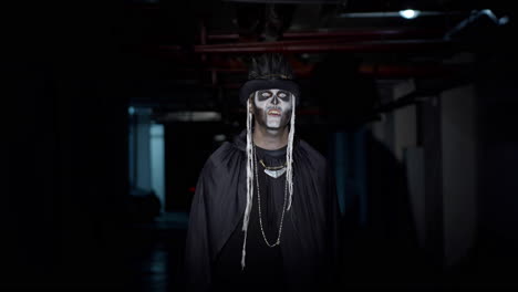 scary guy in carnival costume of halloween skeleton making angry faces, trying to scare on parking