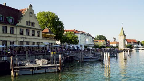 historic promenade of lindau city with restaurants at lake constance