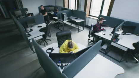 people working in a modern open-plan office