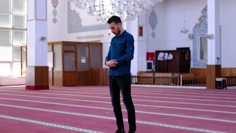 man worshiping in mosque