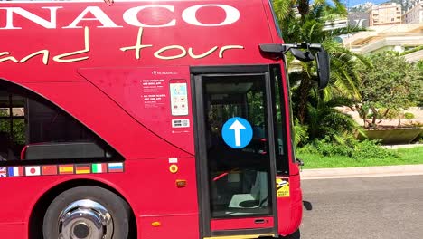 red bus touring scenic monte carlo streets