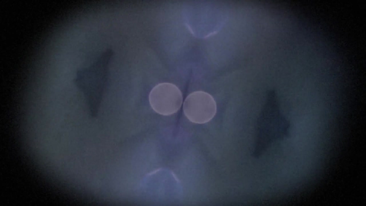 animación de puntos de luz reloj con fondo oscuro