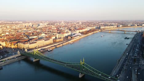 4k drone shot of liberty bridge in budapest hungary with danube river view