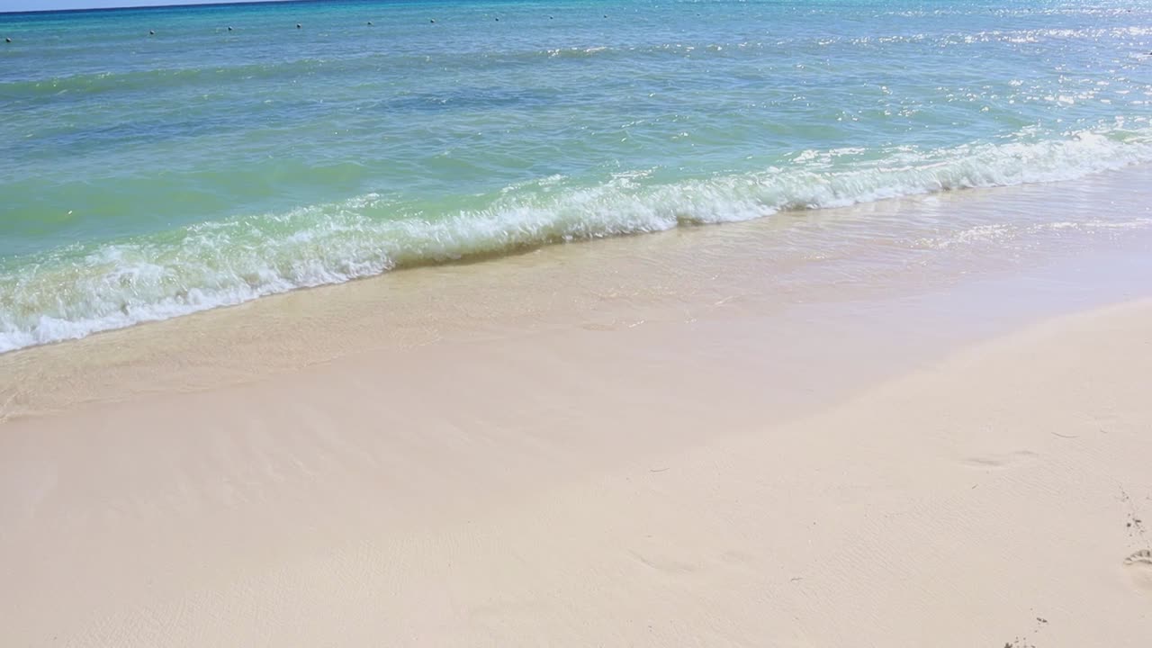 Ocean waves on the beach of the Mayan Riviera - Playa del Carmen, Mexico