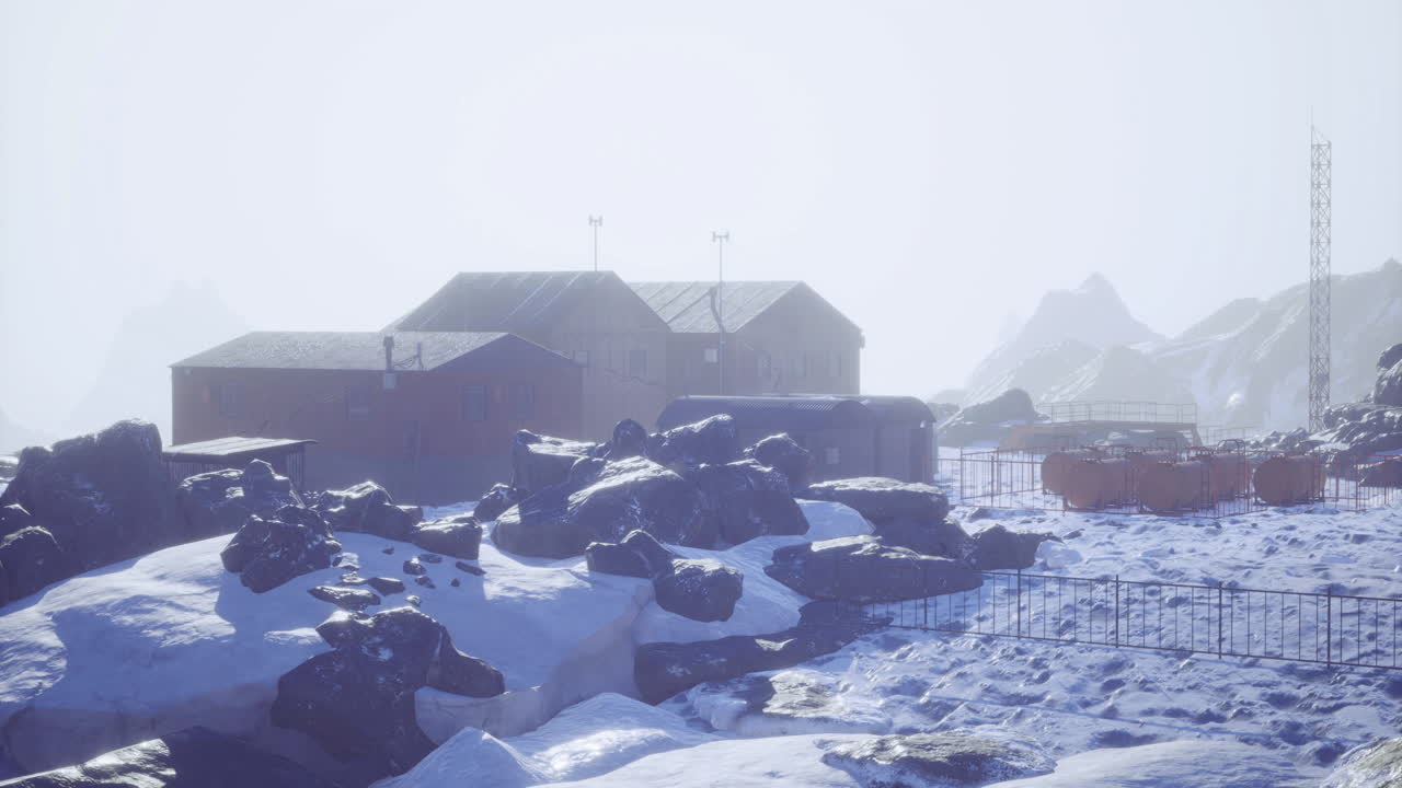Exploring an isolated research station in a snowy mountain landscape