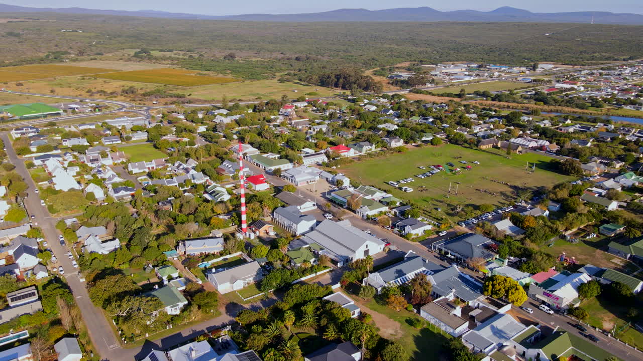 Sunset aerial flight over charming countryside town of Stanford, Overberg, RSA