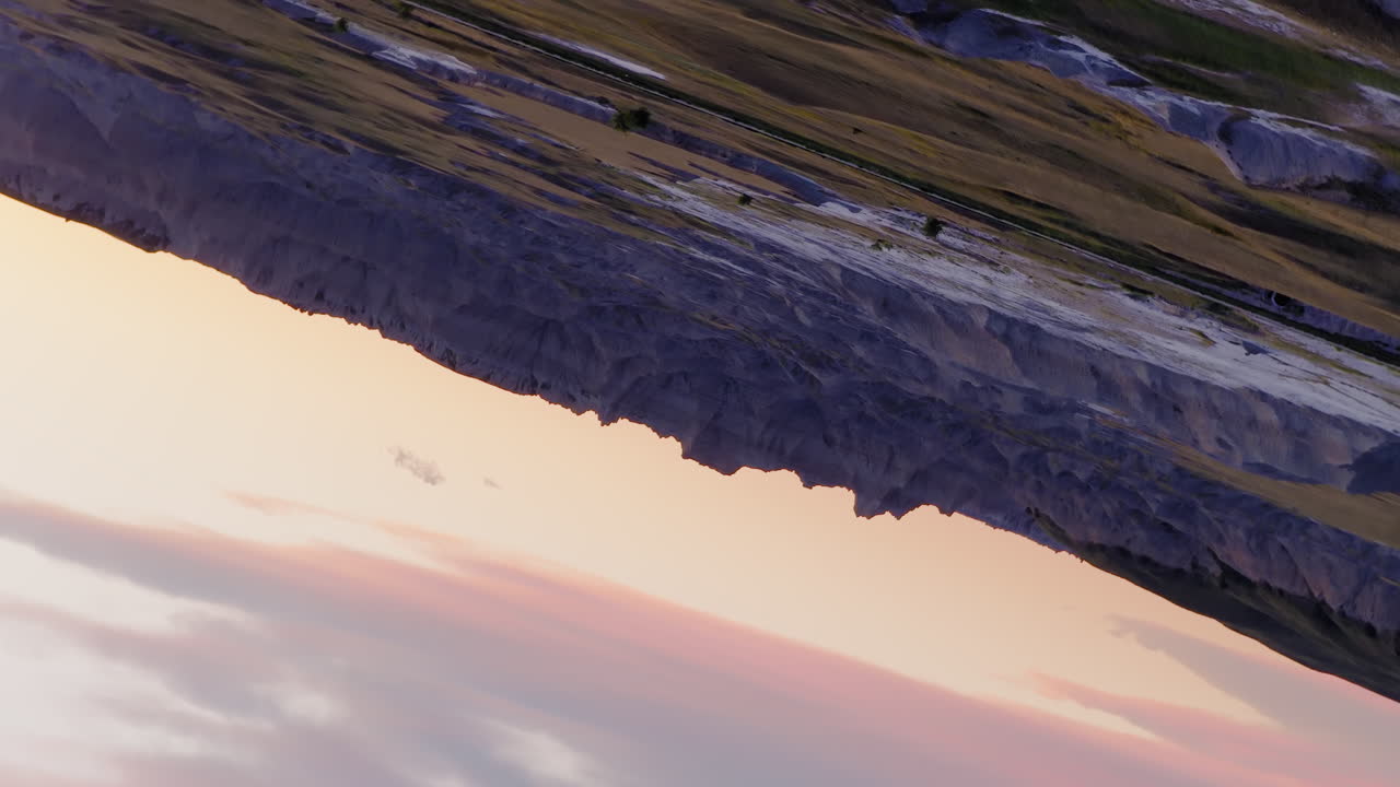 Badlands Horizon Silhouetted by Brilliant Sunset Drone Perspectives