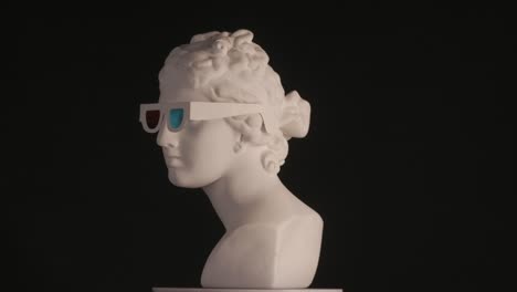 ancient bust with modern sunglasses