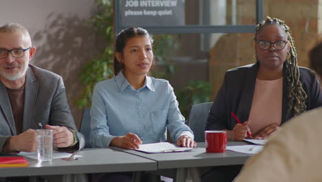 hiring committee interviewing job candidate