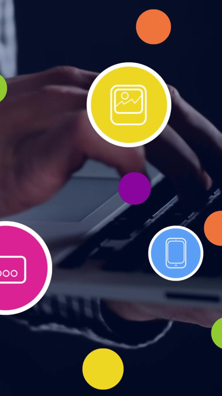 Animation of social media icons against mid section of man using laptop at office