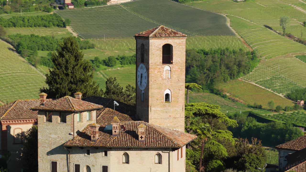 Neive Clock Tower (Torre dell'Orologio) - Famous Landmark In Neive, Medieval Town In Piedmont, Italy. orbiting drone shot