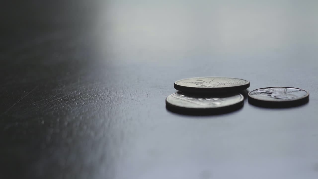 Close-up of US Coins on a Dark Table