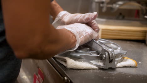 kitchen worker prepares flour tortillas for restaurant, slow motion hd