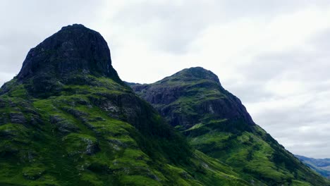 Aerial-Drone-Shot-of-The-Three-Sisters-in-Glen-Coe,-Scotland-02