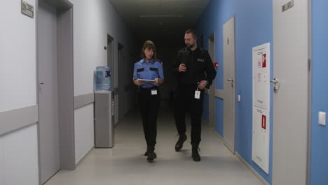 Team-in-uniform-working-on-the-corridor