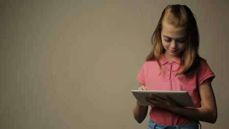 teen girl uses a gadget. teen girl uses a gadget, isolated on background