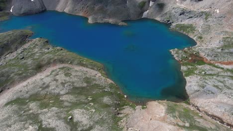 aerial view of blue glacial water, columbine lake, san juan national forest, colorado usa