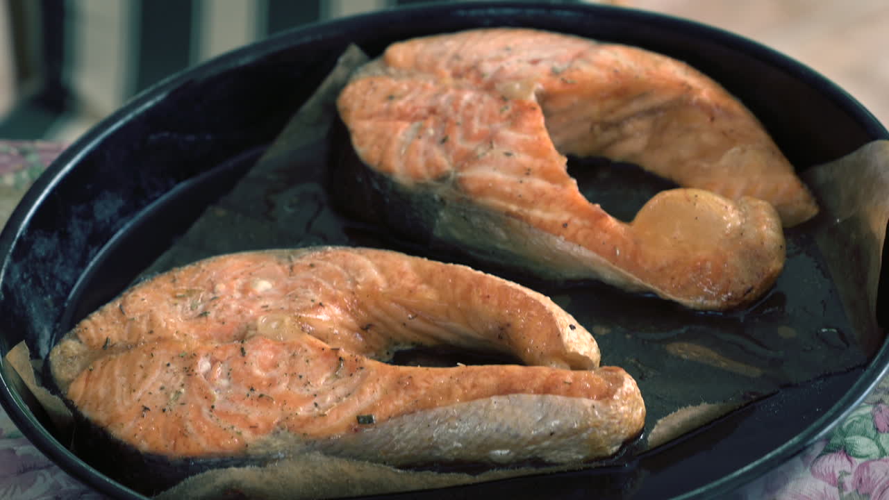 Backed salmon steak on a tray