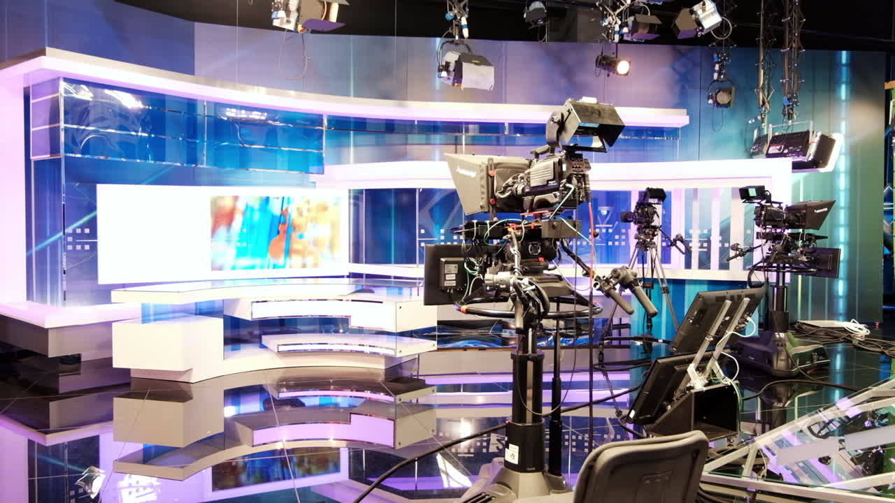 CHISINAU, MOLDOVA - 10 SEPTEMBER, 2019: Professional tv station set with screens and recording cameras and lights