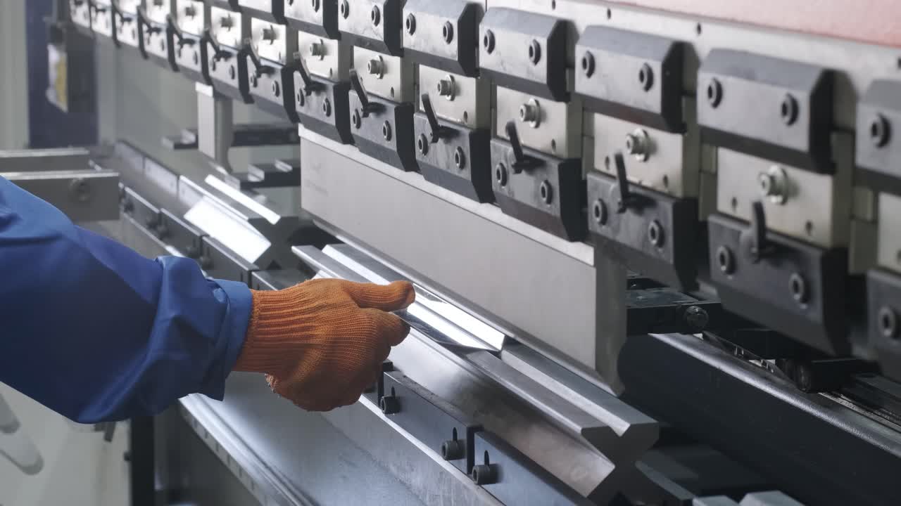 Hydraulic CNC press brake machine. Metal bending press machine. Aluminum folding machine with automatic controlling bending.