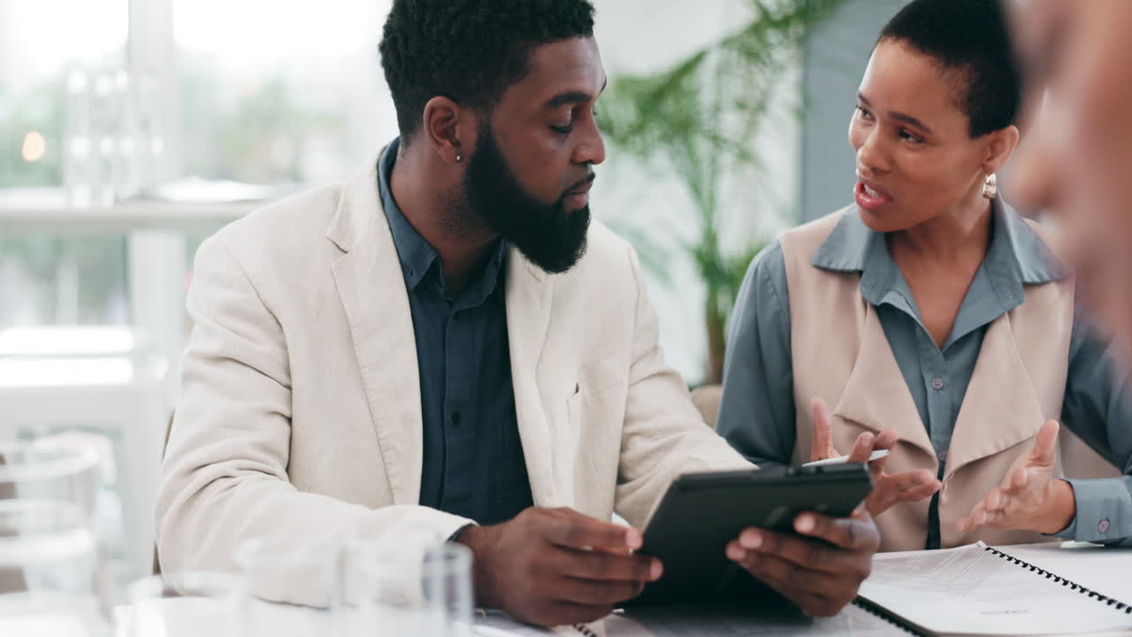 Business people, talking or team with a tablet