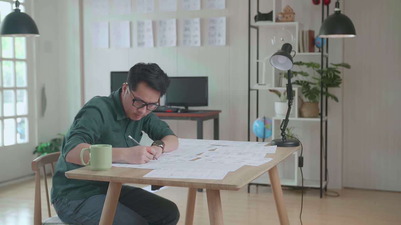 Pre-Production For Film Movie Story Concept : Asian Man Drawing Storyboard Animation Comic Cartoon, Design Creative Scene Layout At Studio. Behind Making Work Before Production Films Or Video Shot