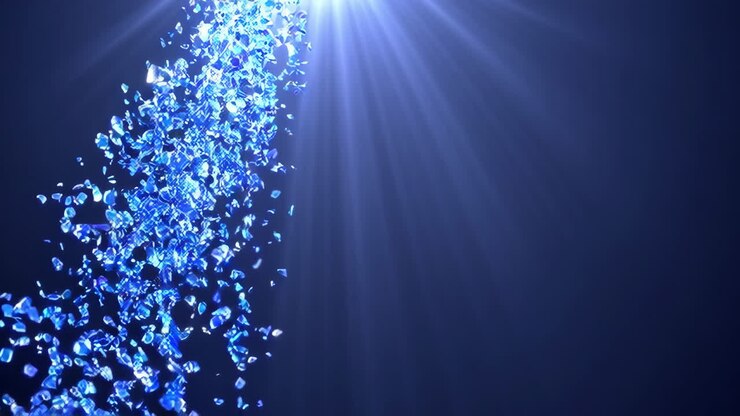 Particelle blu astratte in caduta con raggi di luce