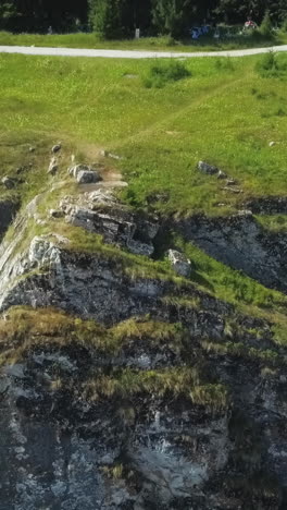 mountainous landscape with grassy areas and rocks