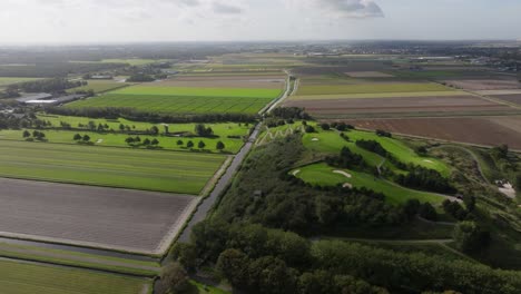 aerial view of dutch farmland and golf course