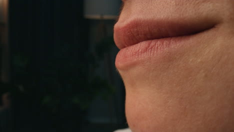 Lady-chewing-bake-home-closeup.-Housewife-mouth-biting-delicious-croissant