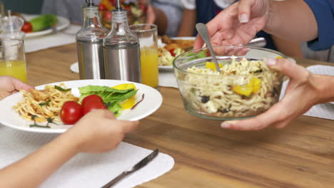 Cute-family-eating-together