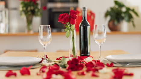 romantic dinner setting with roses and wine