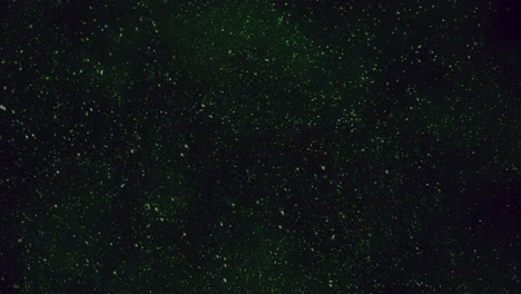 Starry-night-dark-green-background-with-scattered-white-dots