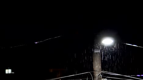 Rain Storm, Thunder Lihgt over urban town houses and electric light post