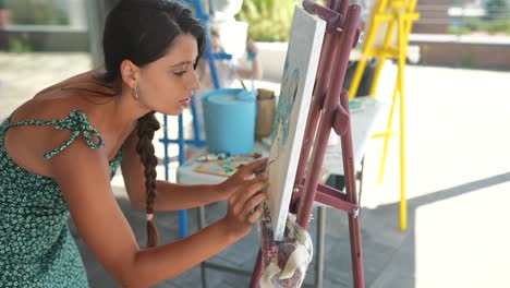 woman painting outdoors
