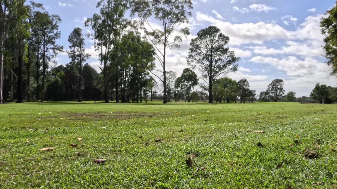Progression of shadows and light on golf course