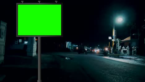 street billboard green screen or chroma key with time lapse traffic background. seamless loop for mock up advertisement