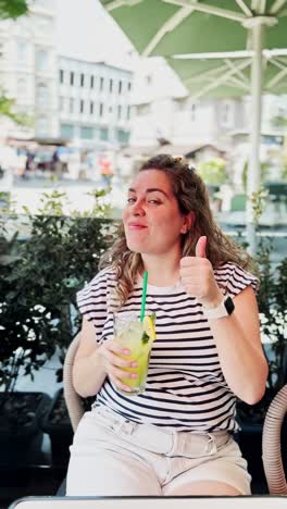 athens cafe culture: tourist enjoying drink