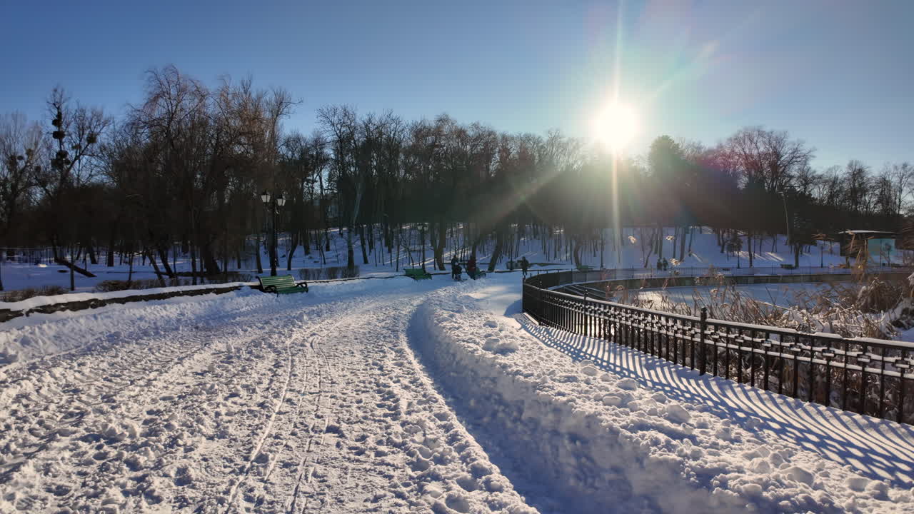 Valea Morilor lake and park covered in white snow in winter in Chisinau, Moldova