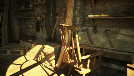 a workshop with a wooden chair and tools