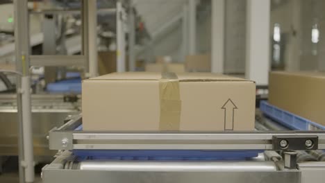boxes on a conveyor belt in a warehouse