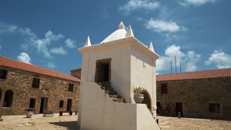 Tilt-up-shot-of-a-small-chapel-from-the-center-of-the-famous-tourist-attraction,-fort-of-the-Three-Wise-Men,-in-the-coastal-capital-city-of-Natal-in-Rio-Grande-do-Norte,-Brazil-on-a-warm-summer-day