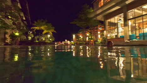 beautiful pool at swarga suites bali berawa, marclan collection hotel in bali, indonesia - wide shot