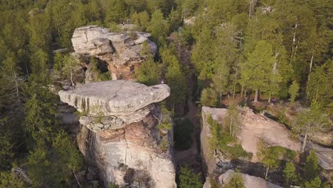 aerial view of unique rock formation in forest