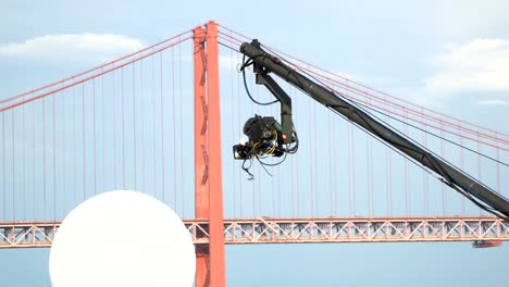 live event video camera on crane over white