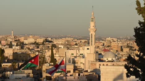 stunning view of he madaba's skyline during a beautiful sunset. madaba is an ancient town in jordan, southwest of the capital amman.