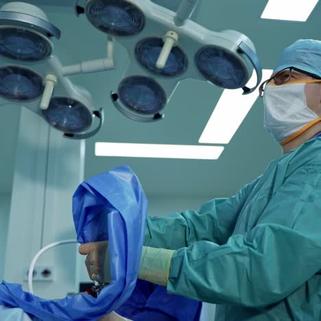 operating room in modern clinic. team of surgeons operating in the modern hospital