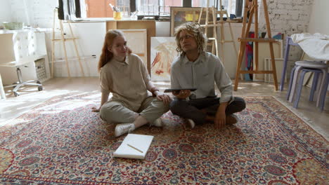 Male-and-female-artist-in-an-art-studio